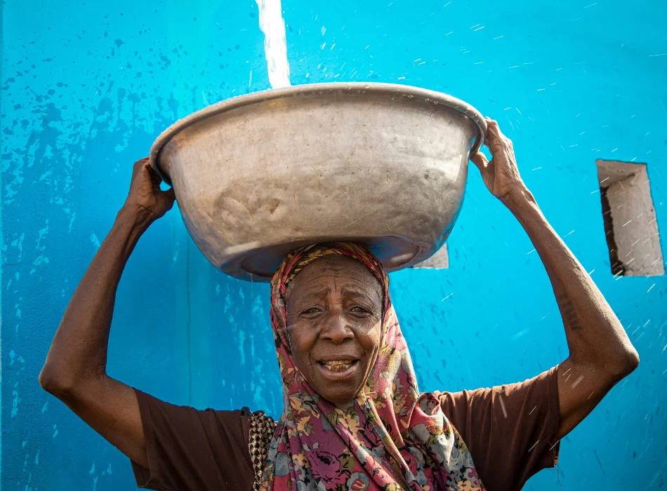 Happy villagers with clean water